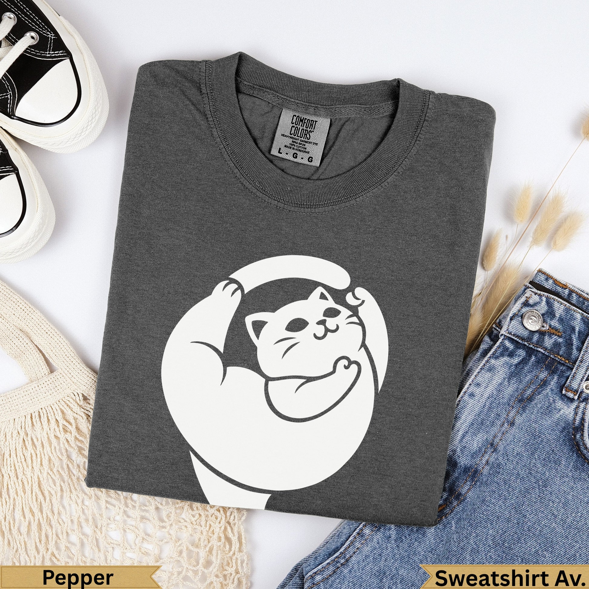 Dark gray Comfort Colors sweatshirt with a white cartoon cat doing yoga.