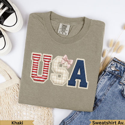 Khaki Comfort Colors sweatshirt with "USA" in patriotic patch design.