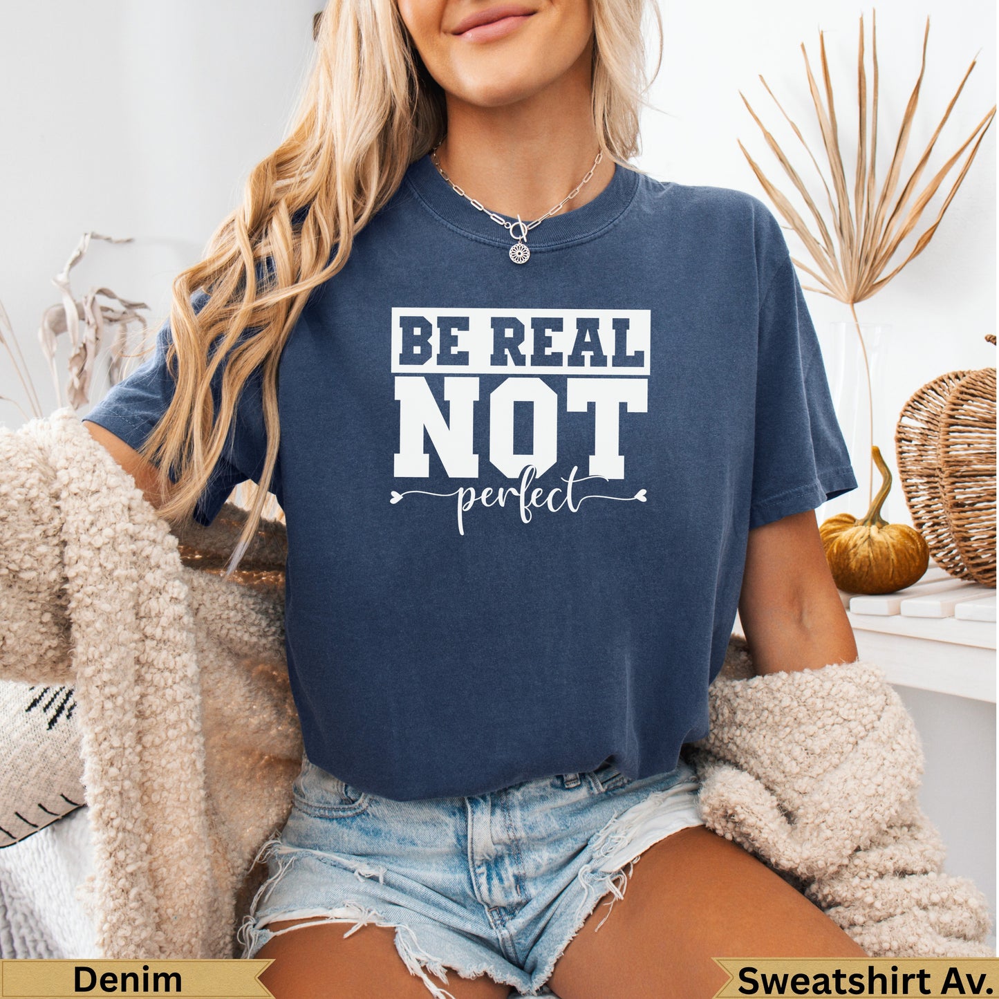 Navy blue t-shirt with "BE REAL NOT perfect" text.