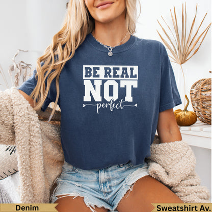 Navy blue t-shirt with "BE REAL NOT perfect" text.