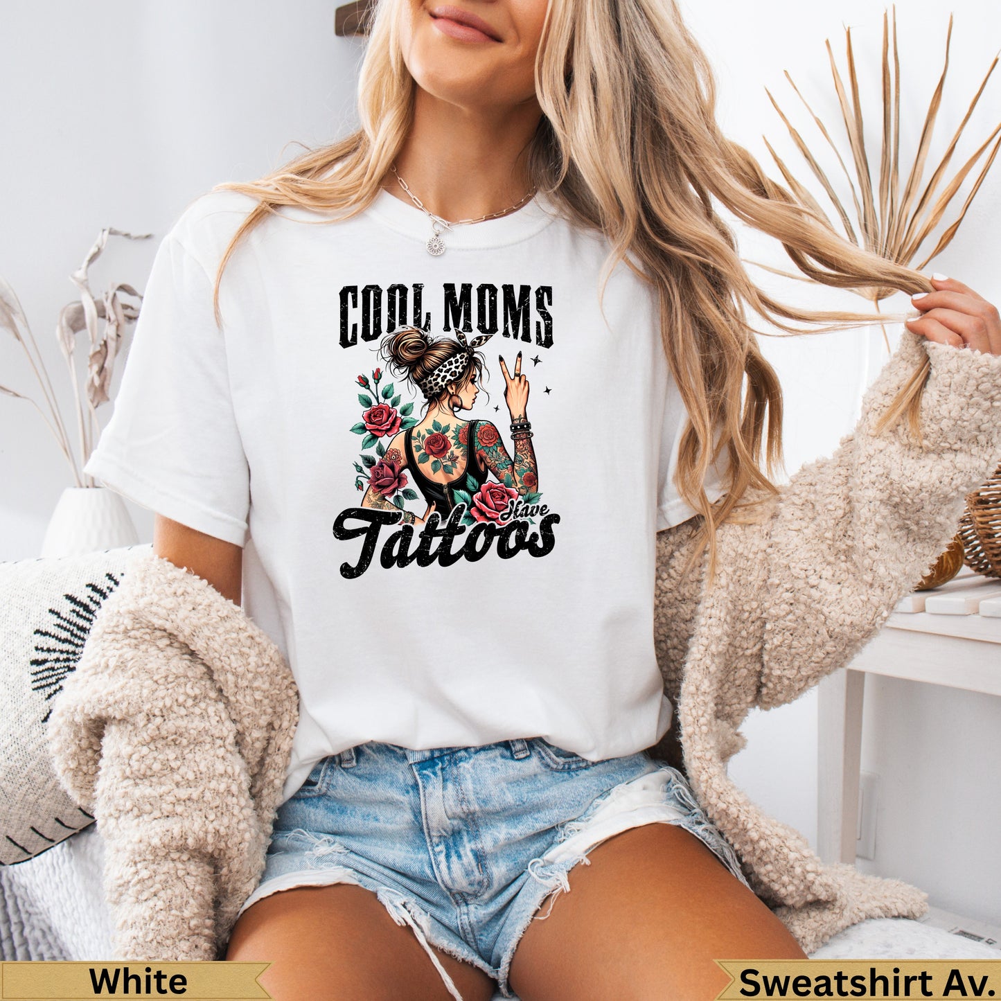 White t-shirt with "Cool Moms Have Tattoos" design and floral tattoo illustration.