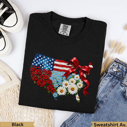 Black t-shirt with American flag floral design and red bow.