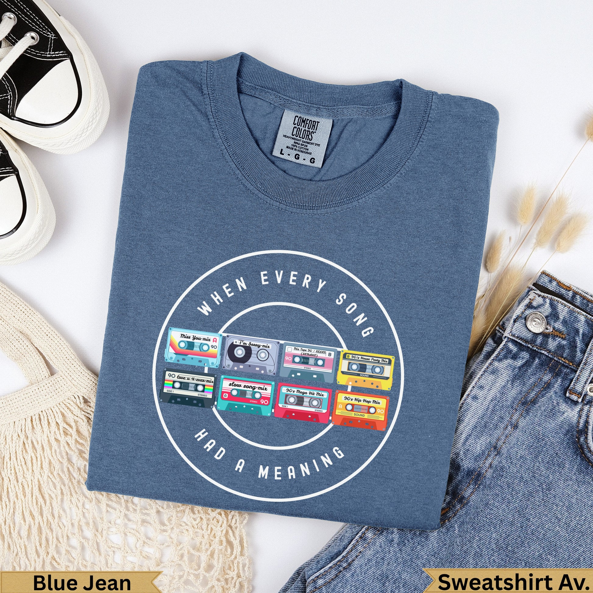 Blue Jean sweatshirt with 90s mixtape graphic reading "when every song had a meaning."