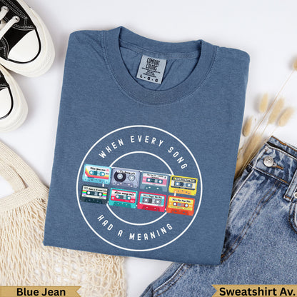 Blue Jean sweatshirt with 90s mixtape graphic reading "when every song had a meaning."