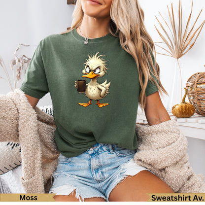 Cartoon duck wearing a shirt, holding a coffee cup, on an olive green t-shirt.