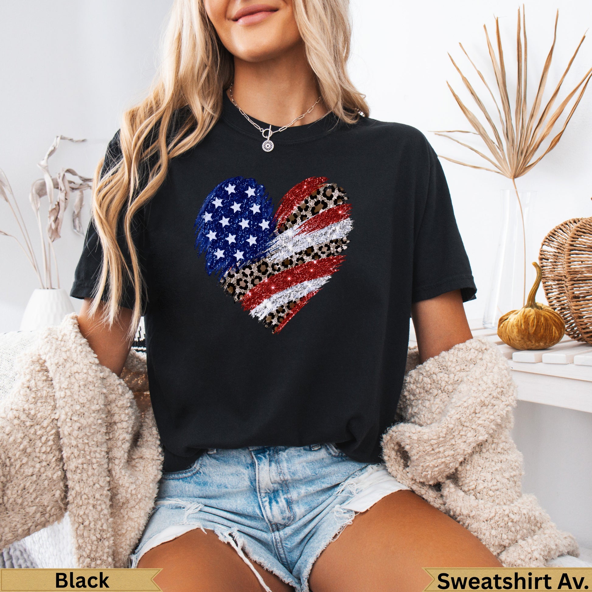 Black crewneck t-shirt with American flag and leopard print heart graphic.