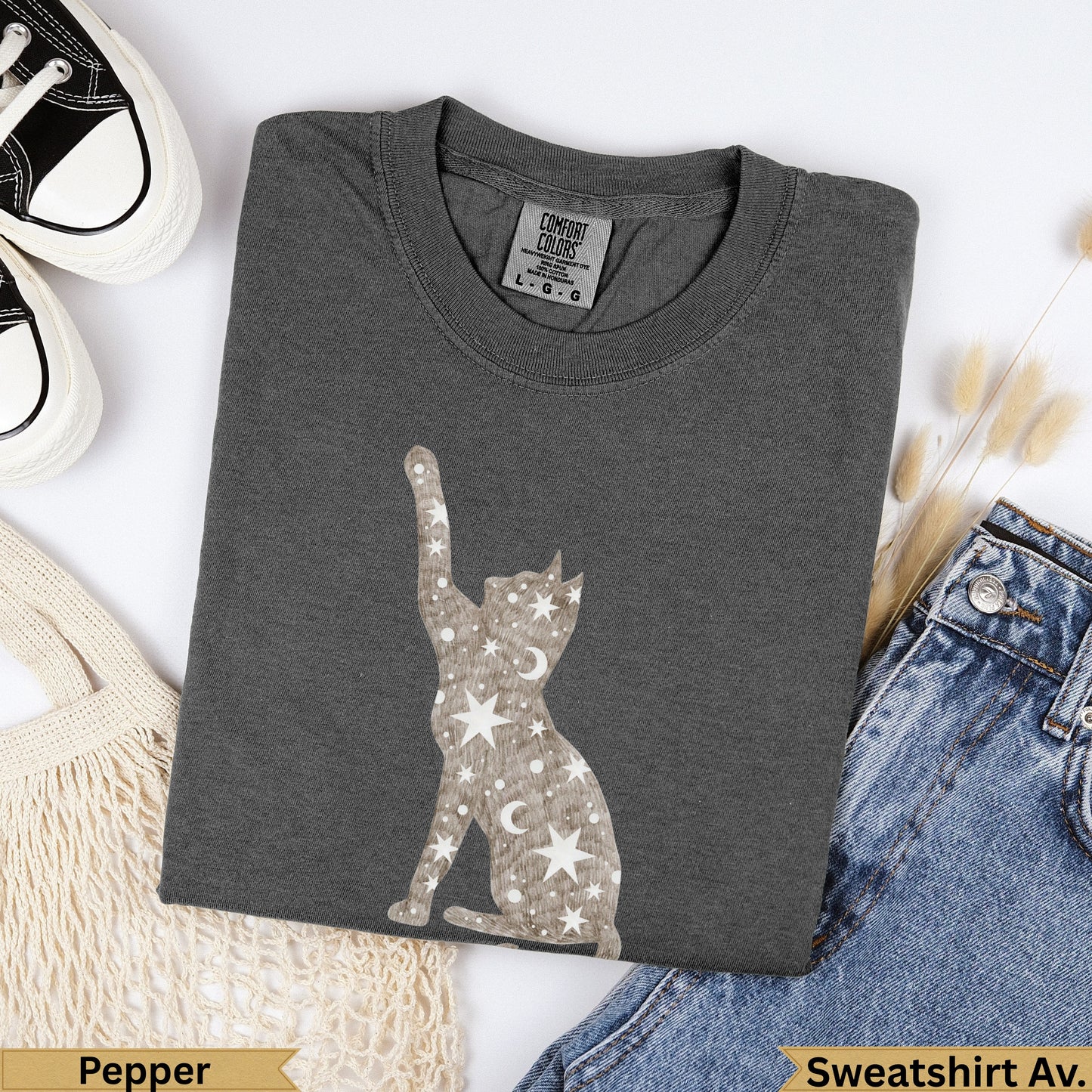 Charcoal t-shirt with celestial cat graphic, "Pepper" and "Sweatshirt Av." text.