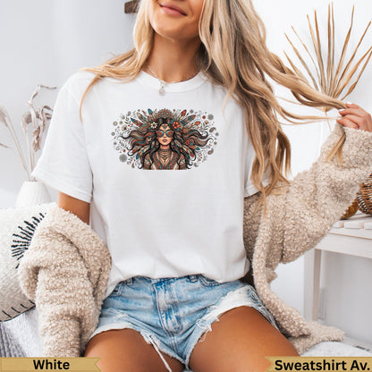 Woman wearing white graphic t-shirt with bohemian style illustration.