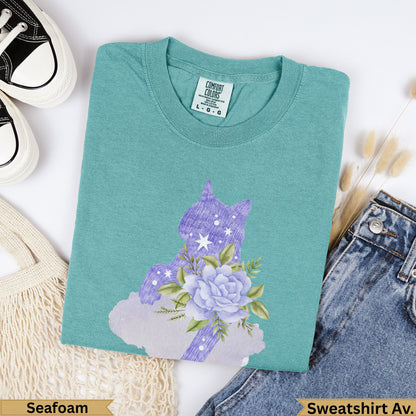 Teal sweatshirt with purple unicorn and flower graphic, "Seafoam" text.