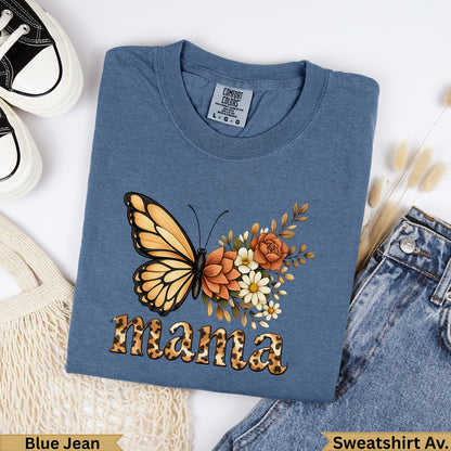 Blue t-shirt with orange butterfly and floral design, reading "Mama".