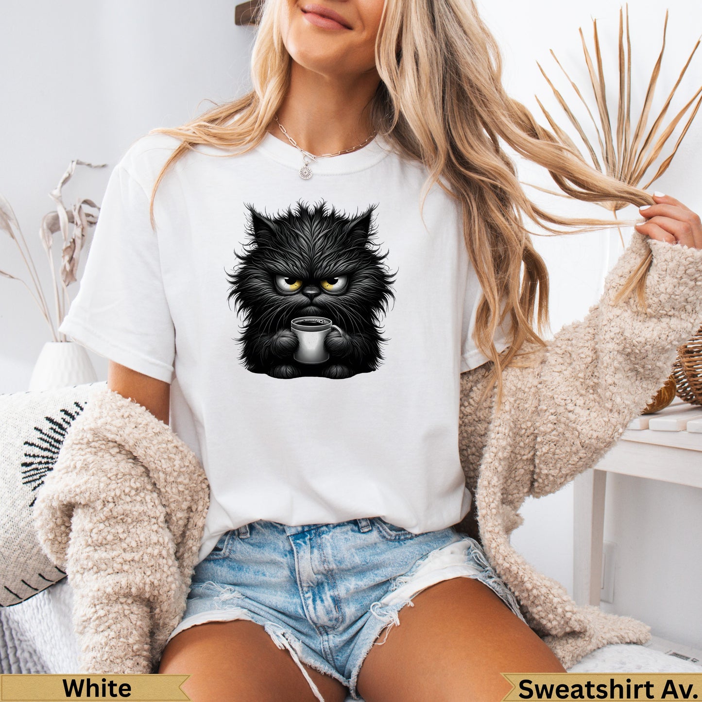 Black cat with coffee mug graphic on white crew neck t-shirt.
