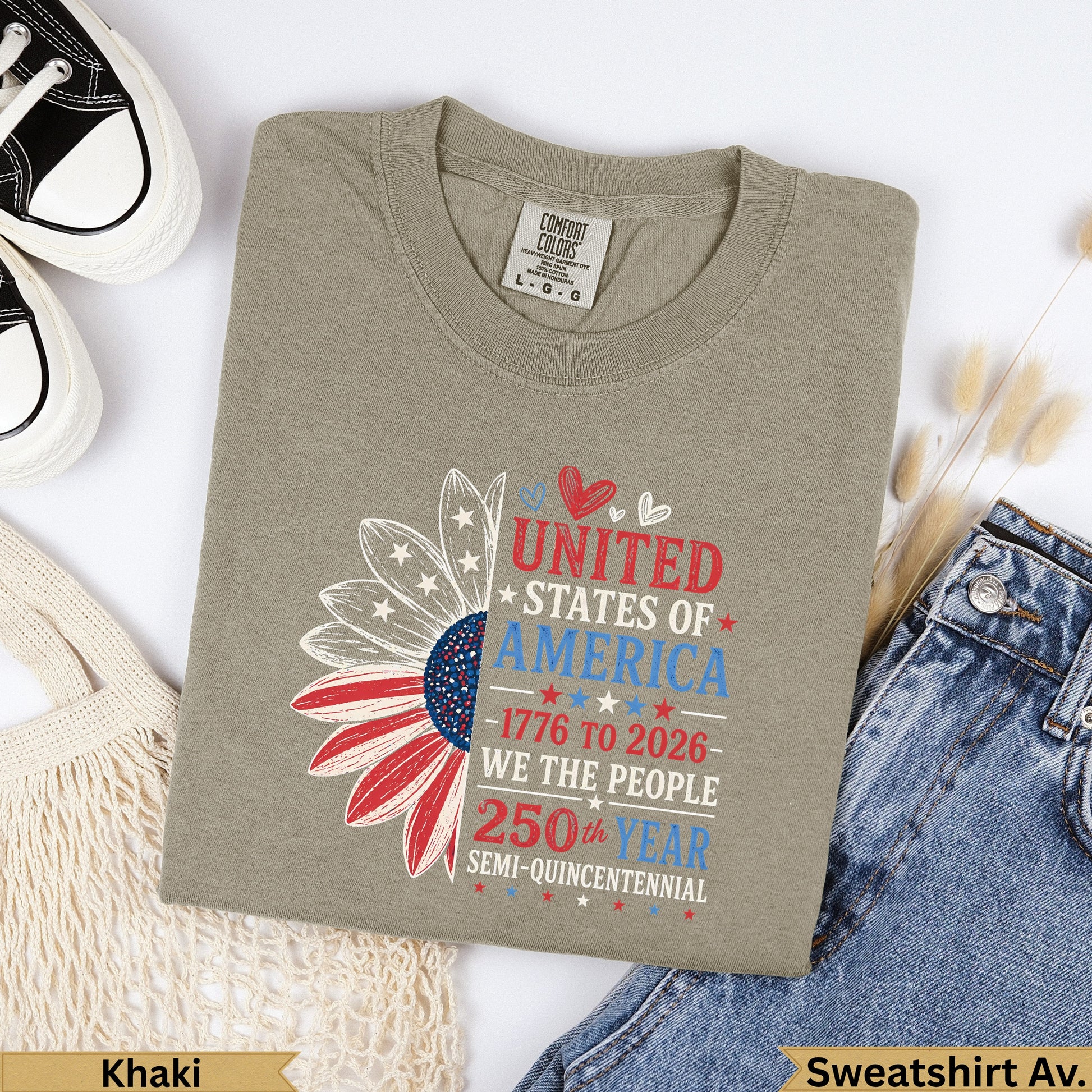Khaki t-shirt with sunflower graphic and patriotic text.
