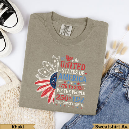 Khaki t-shirt with sunflower graphic and patriotic text.