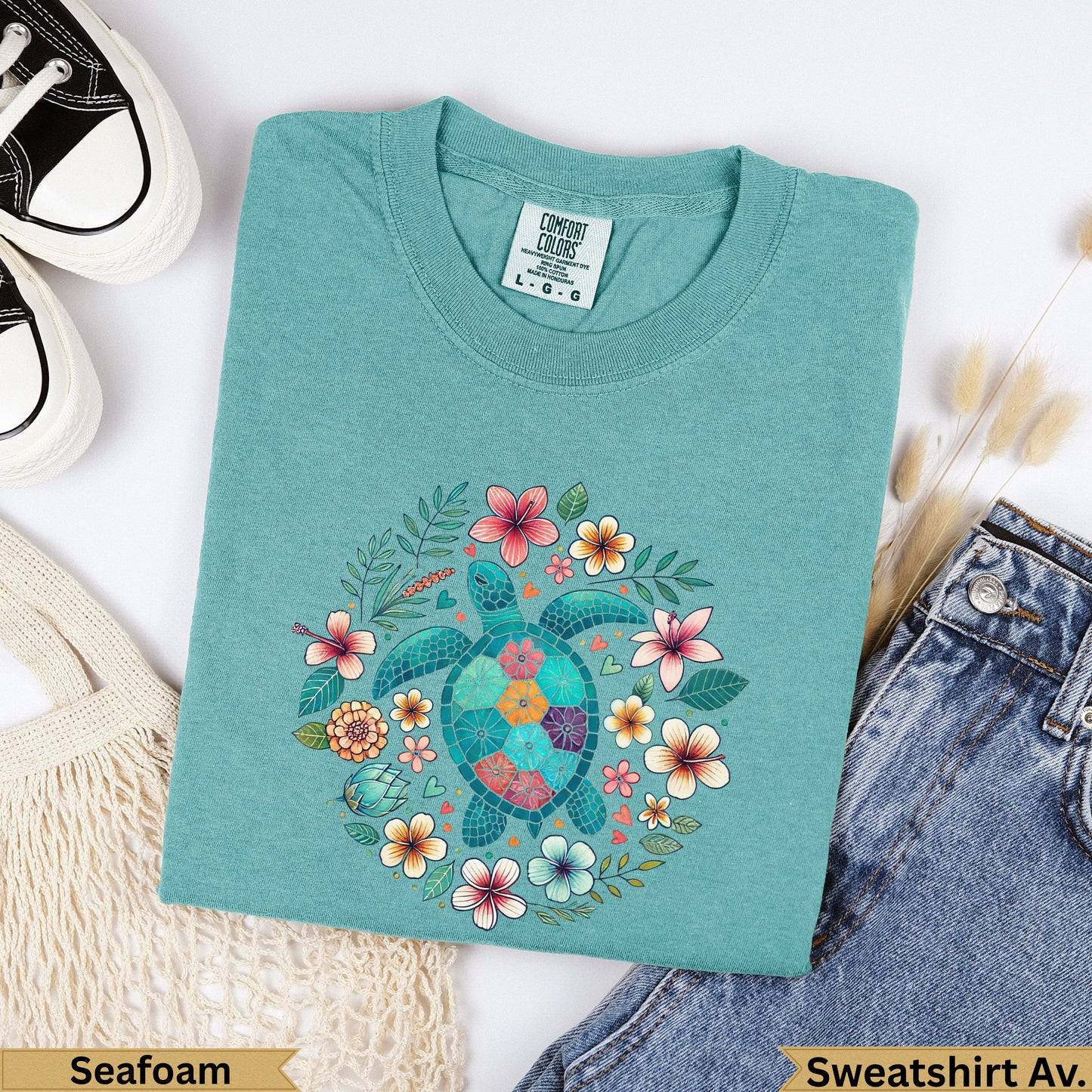 Teal Comfort Colors t-shirt with a sea turtle and floral wreath design.