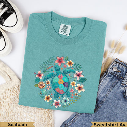 Teal Comfort Colors t-shirt with a sea turtle and floral wreath design.