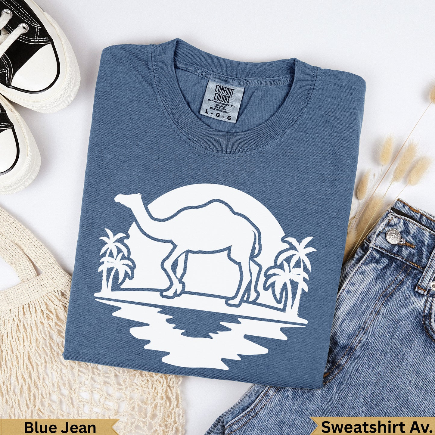 Blue Jean Comfort Colors t-shirt with camel and palm trees graphic.