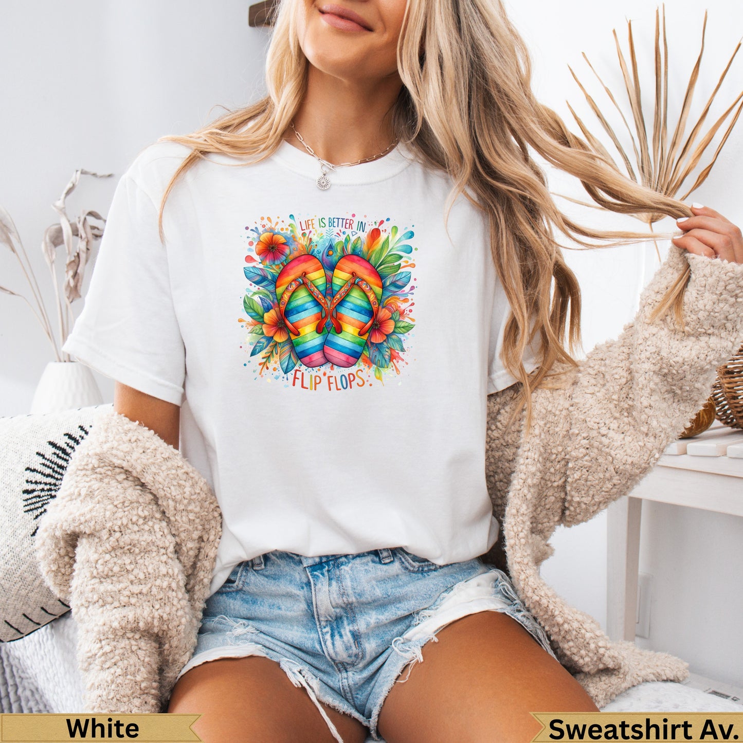 White t-shirt with colorful flip-flops and floral graphic, "Life is Better in Flip Flops".