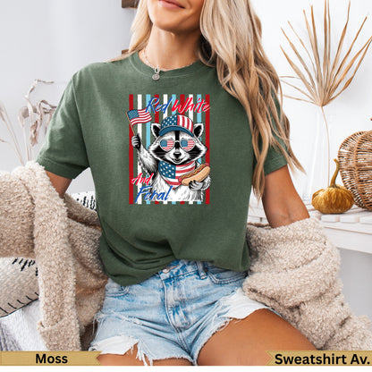 Raccoon in sunglasses and hat holding American flag and hot dog.