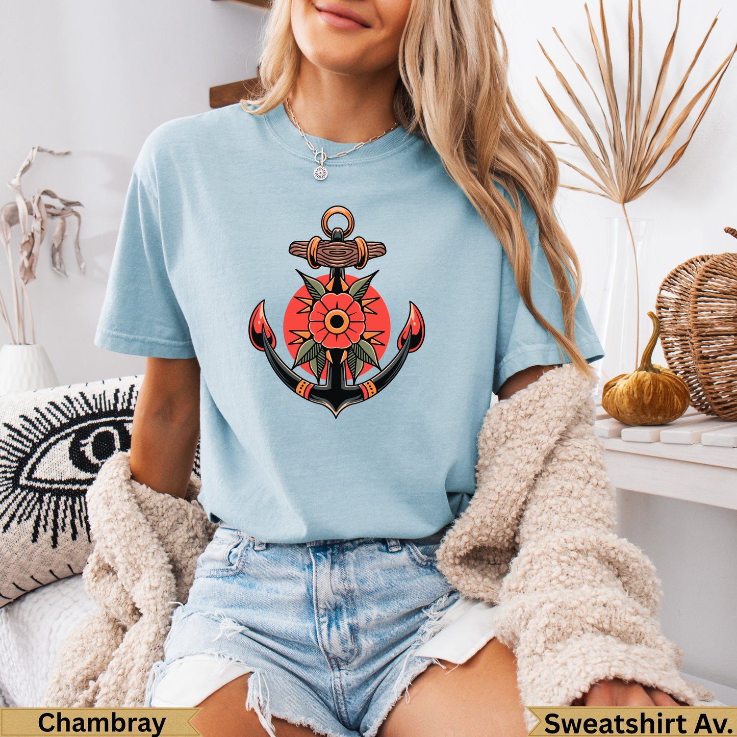 Light blue t-shirt with traditional anchor and rose tattoo design.