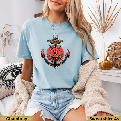 Light blue t-shirt with traditional anchor and rose tattoo design.