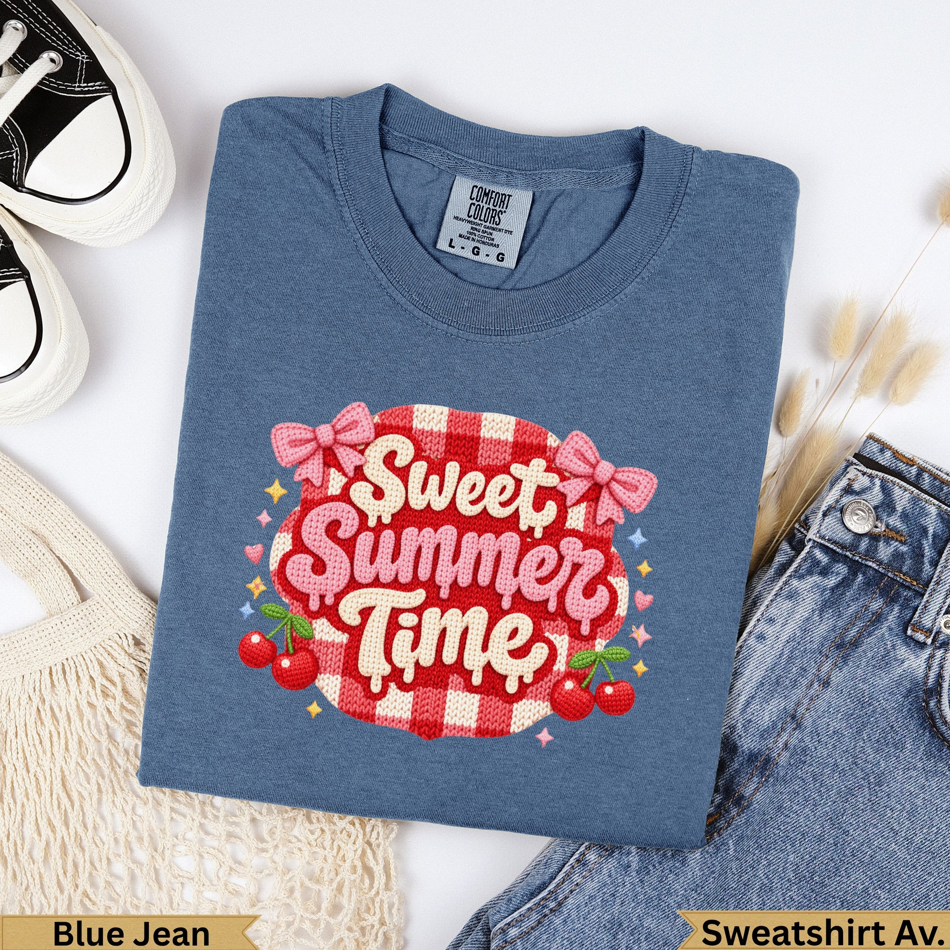 Blue t-shirt with "Sweet Summer Time" text, cherries, and bows graphic.