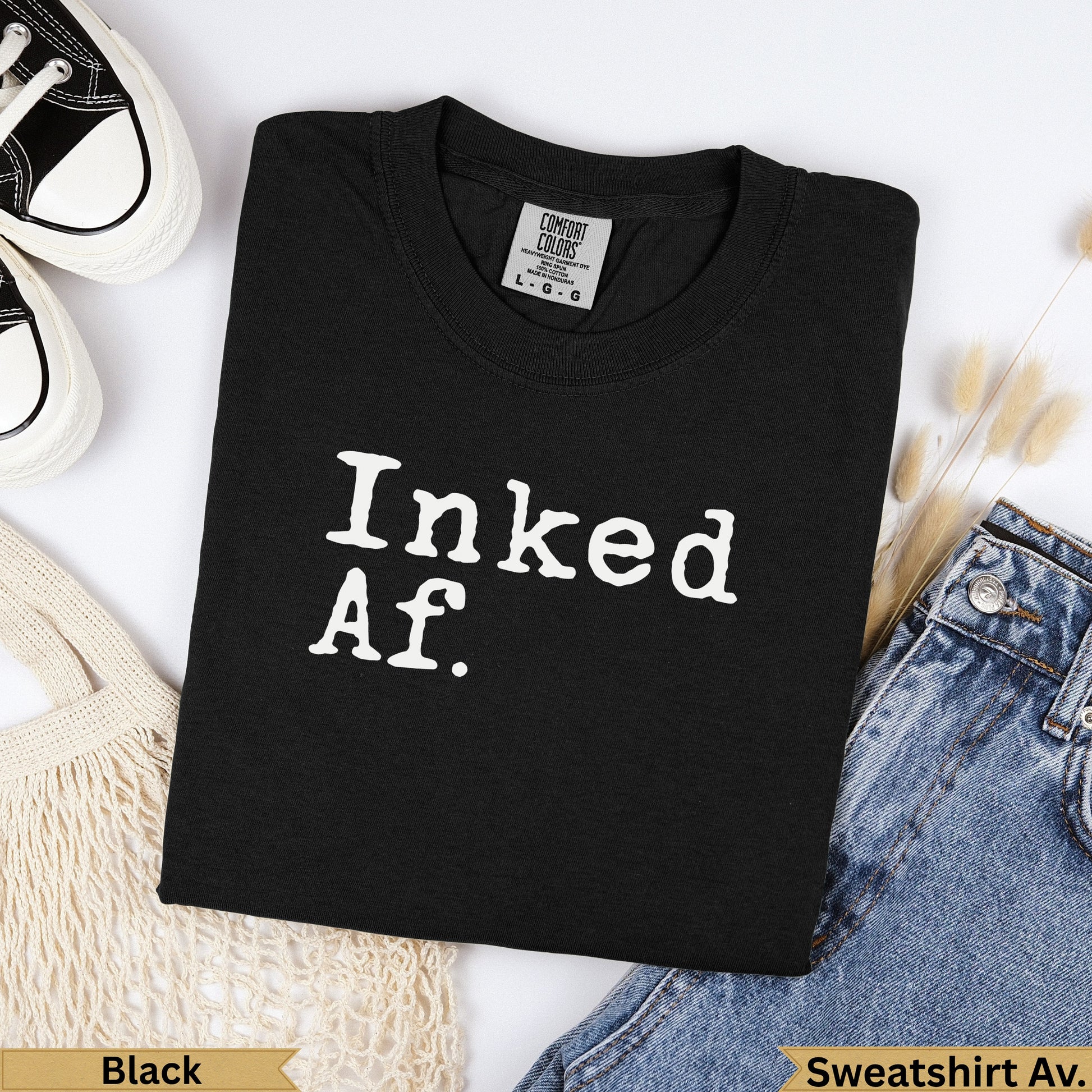 Black Comfort Colors t-shirt with "Inked Af." printed in white.