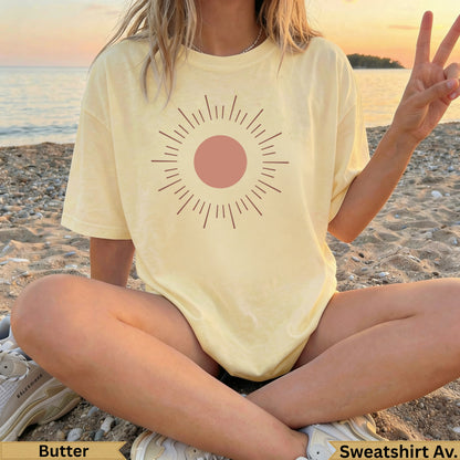 Yellow t-shirt with sun graphic and "Butter" text.