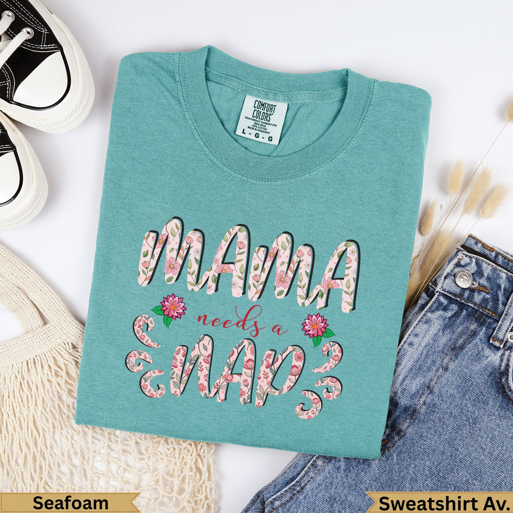 Teal Comfort Colors sweatshirt with "MAMA needs a nap" floral text.
