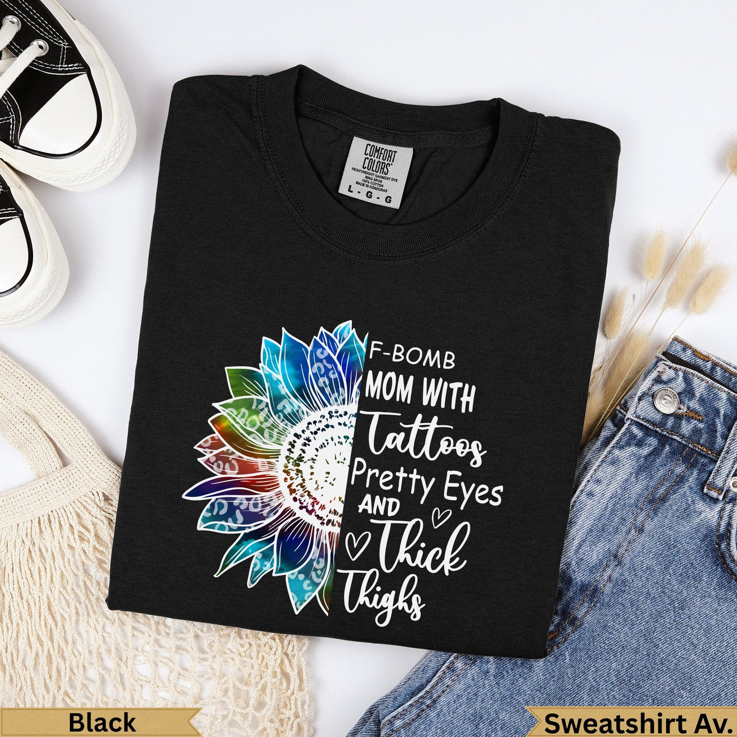 Black crewneck t-shirt with "F-Bomb Mom" sunflower graphic.