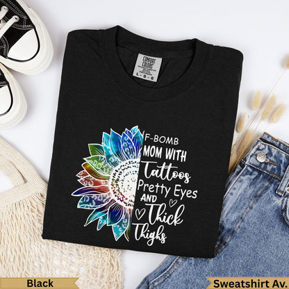 Black crewneck t-shirt with "F-Bomb Mom" sunflower graphic.