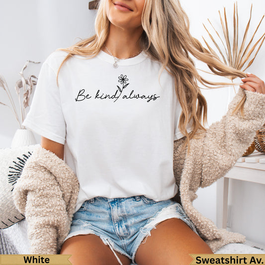 White graphic t-shirt with "be kind always" floral design.