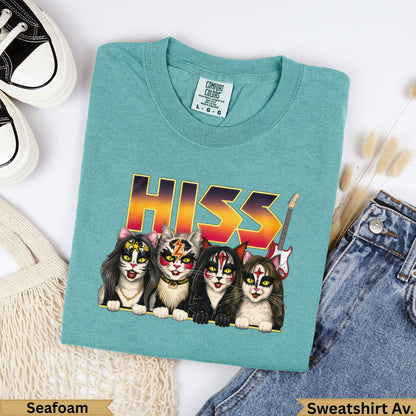 Four punk rock cats with "HISS" text above on a teal Comfort Colors sweatshirt.