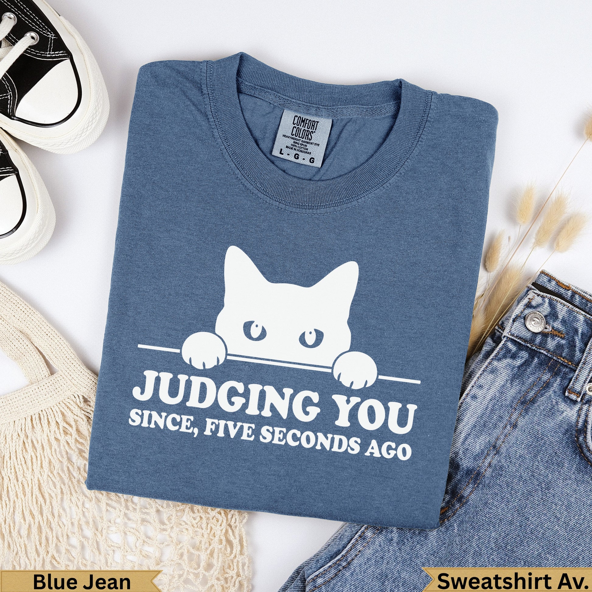 Blue Jean Comfort Colors t-shirt with cat graphic saying "Judging You Since, Five Seconds Ago".