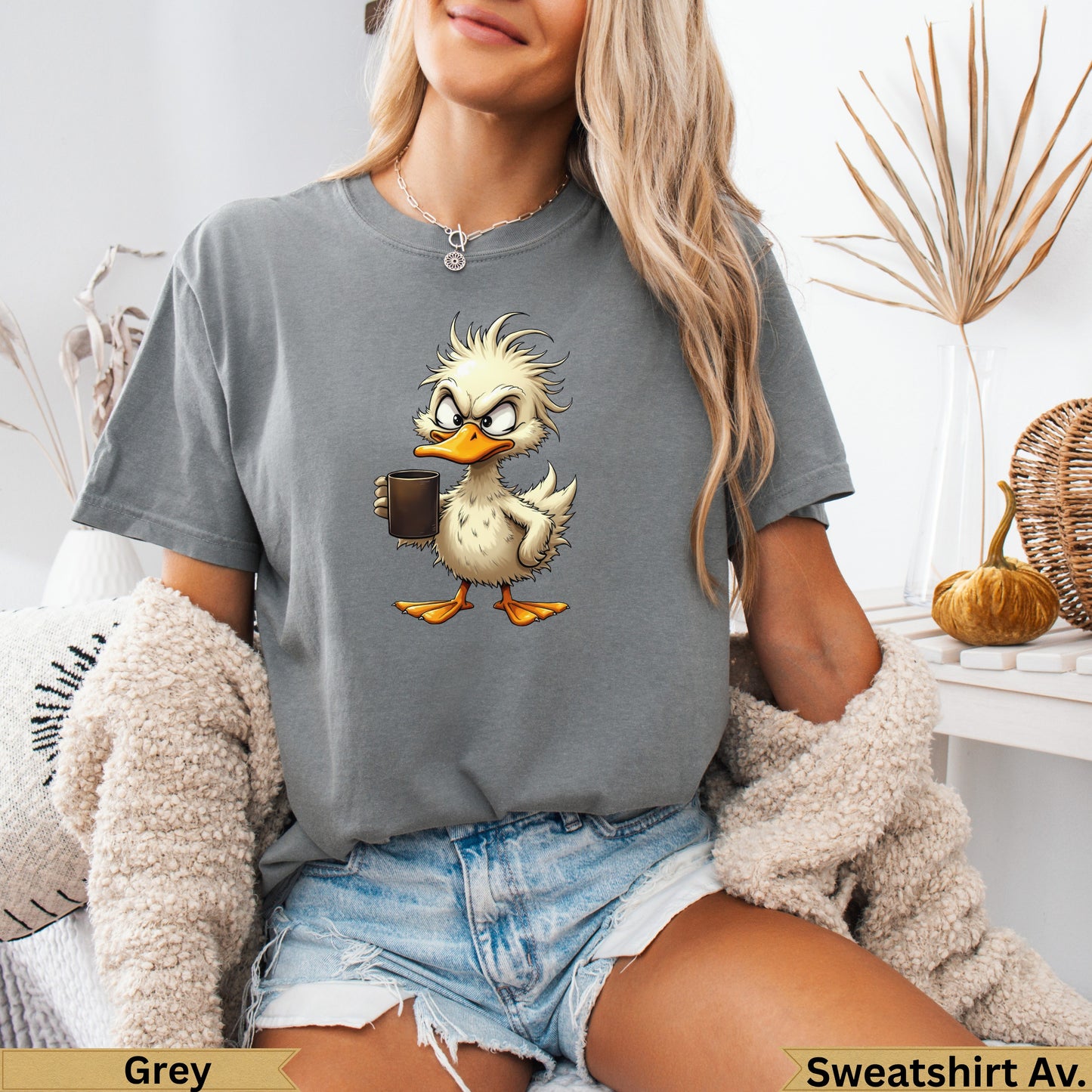 Grey t-shirt with a cartoon duck holding a coffee cup.