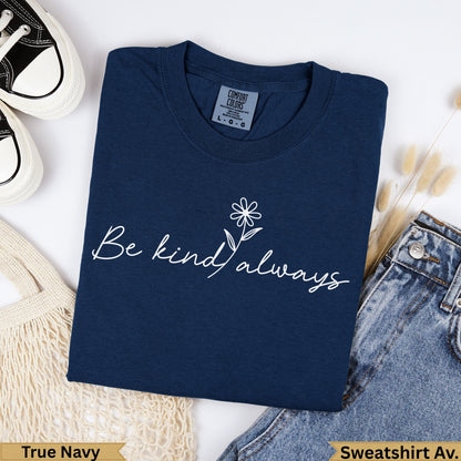 Navy Comfort Colors sweatshirt with "Be kind always" text and a flower.