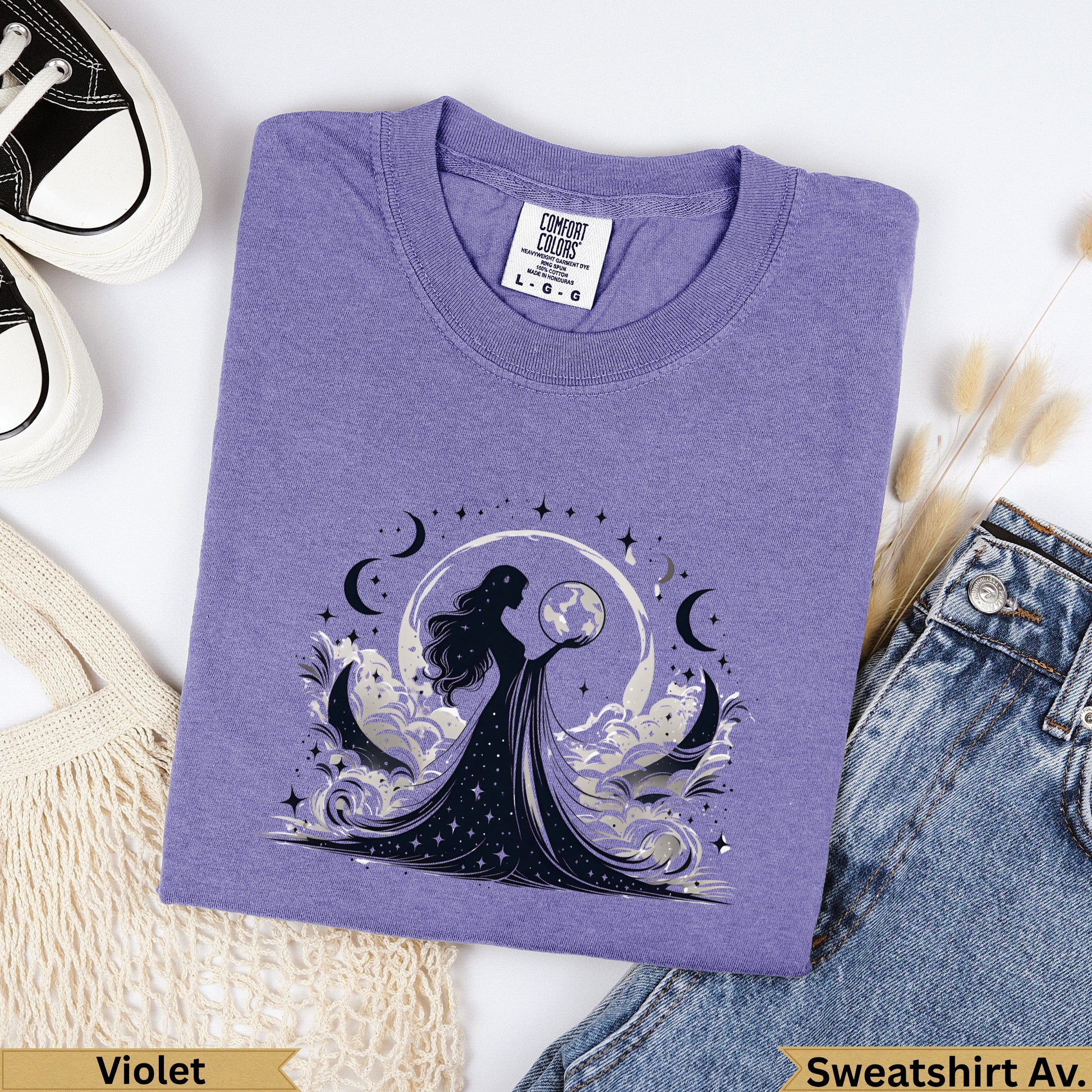 Lavender Comfort Colors sweatshirt with celestial woman graphic and text.
