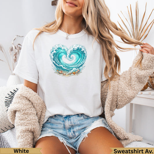 White t-shirt with a heart-shaped wave and beach scene graphic.