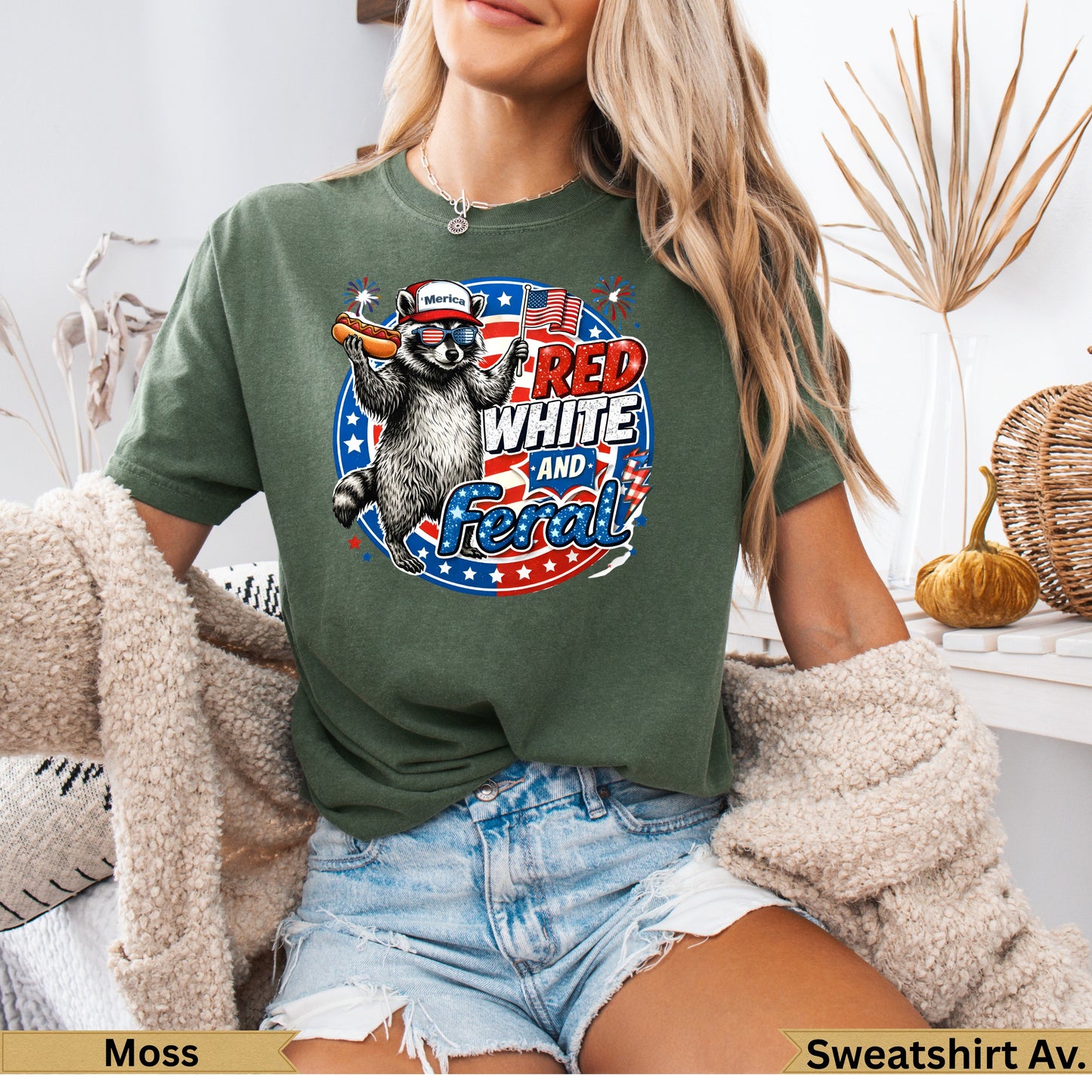 Raccoon wearing sunglasses and holding a hot dog, "Red White and Feral" text.