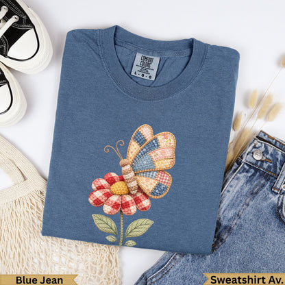 Blue Jean Comfort Colors sweatshirt with a patchwork butterfly and flower design.