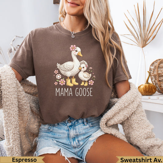 Mama Goose graphic on a brown t-shirt with geese and flowers.