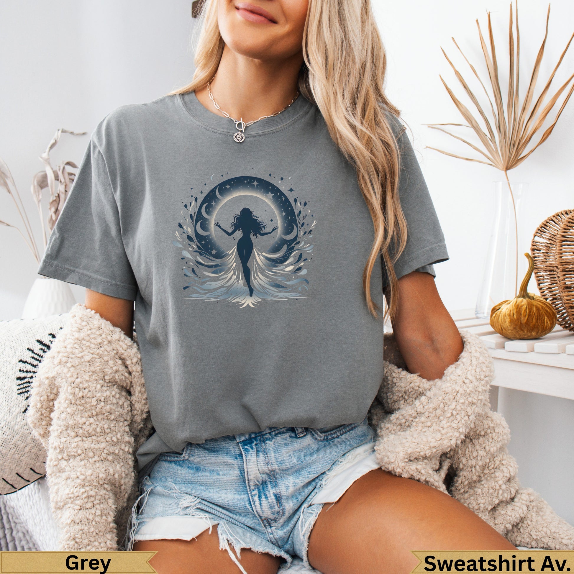 Grey t-shirt with graphic of woman under moon with celestial design.