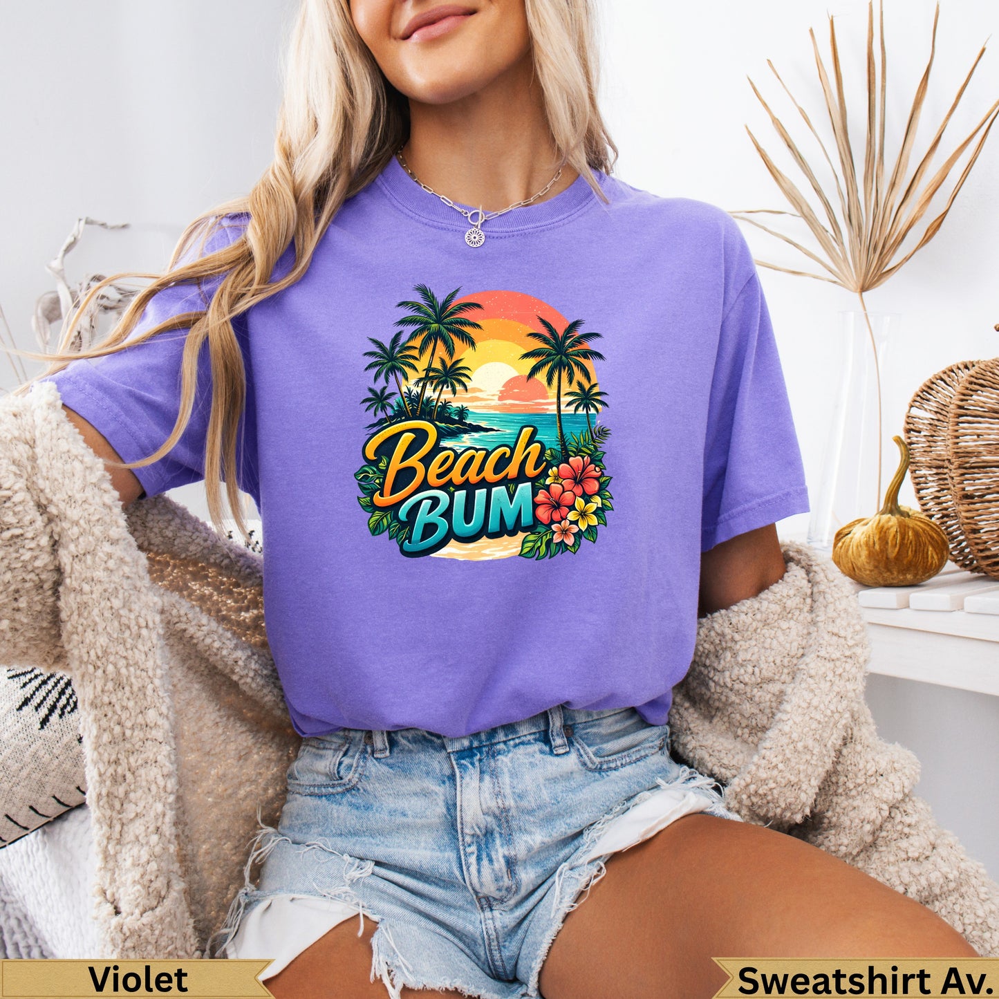 Purple t-shirt with "Beach Bum" text, palm trees, and sunset graphic.