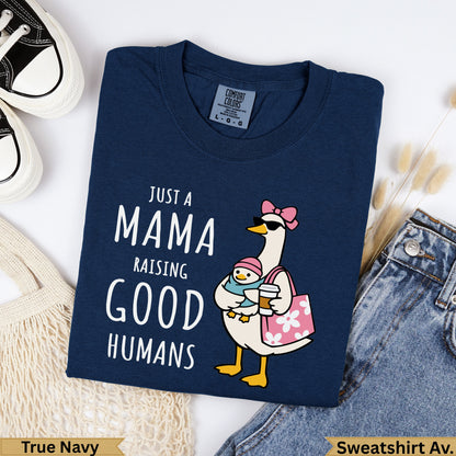 Navy sweatshirt with cartoon goose and text "Just a Mama Raising Good Humans".