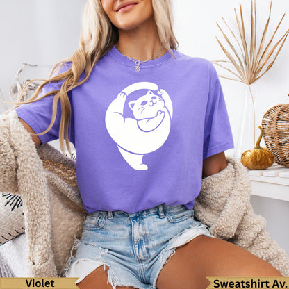 Purple t-shirt with a white cat graphic on the front.