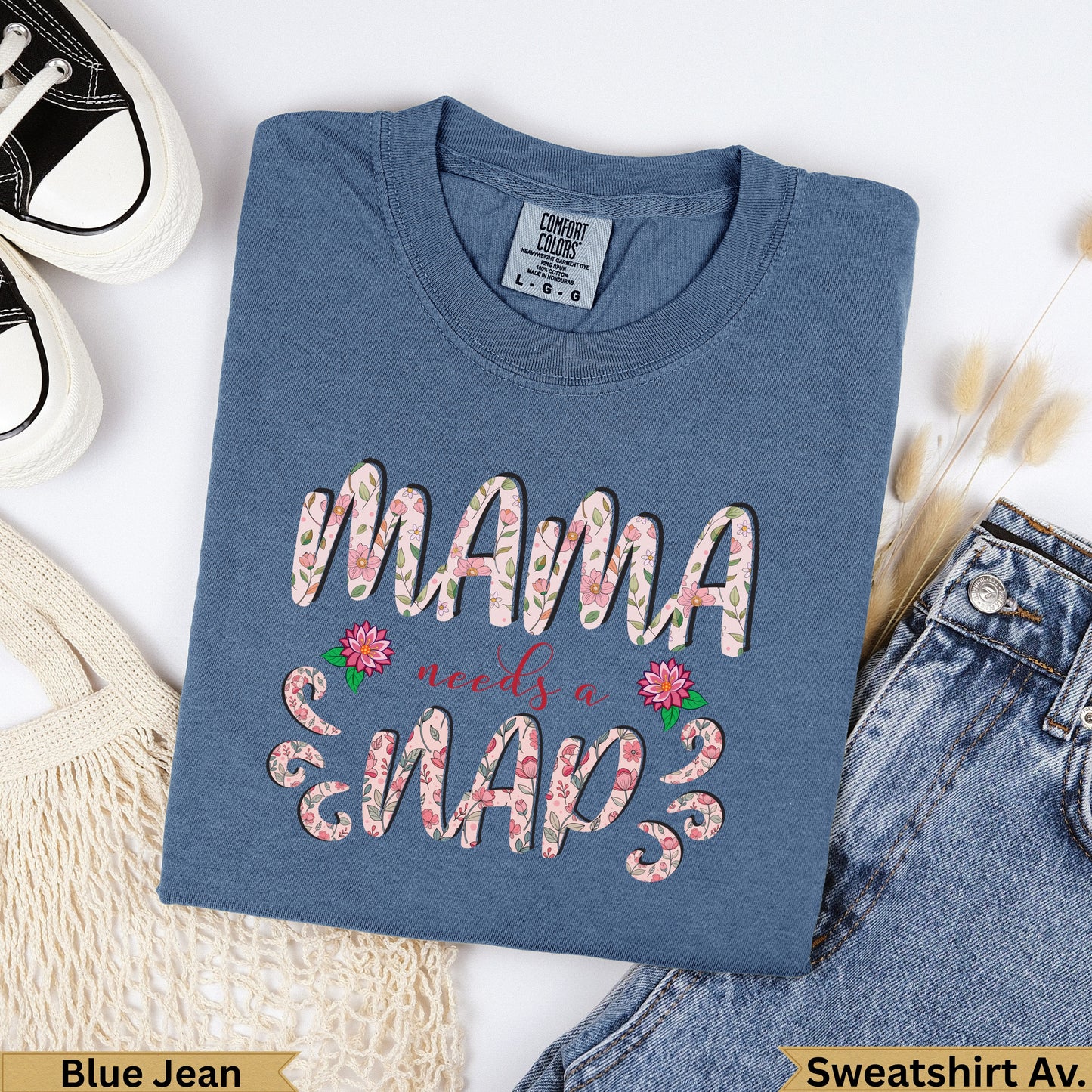 Blue Jean Comfort Colors sweatshirt with "MAMA needs a nap" floral graphic.