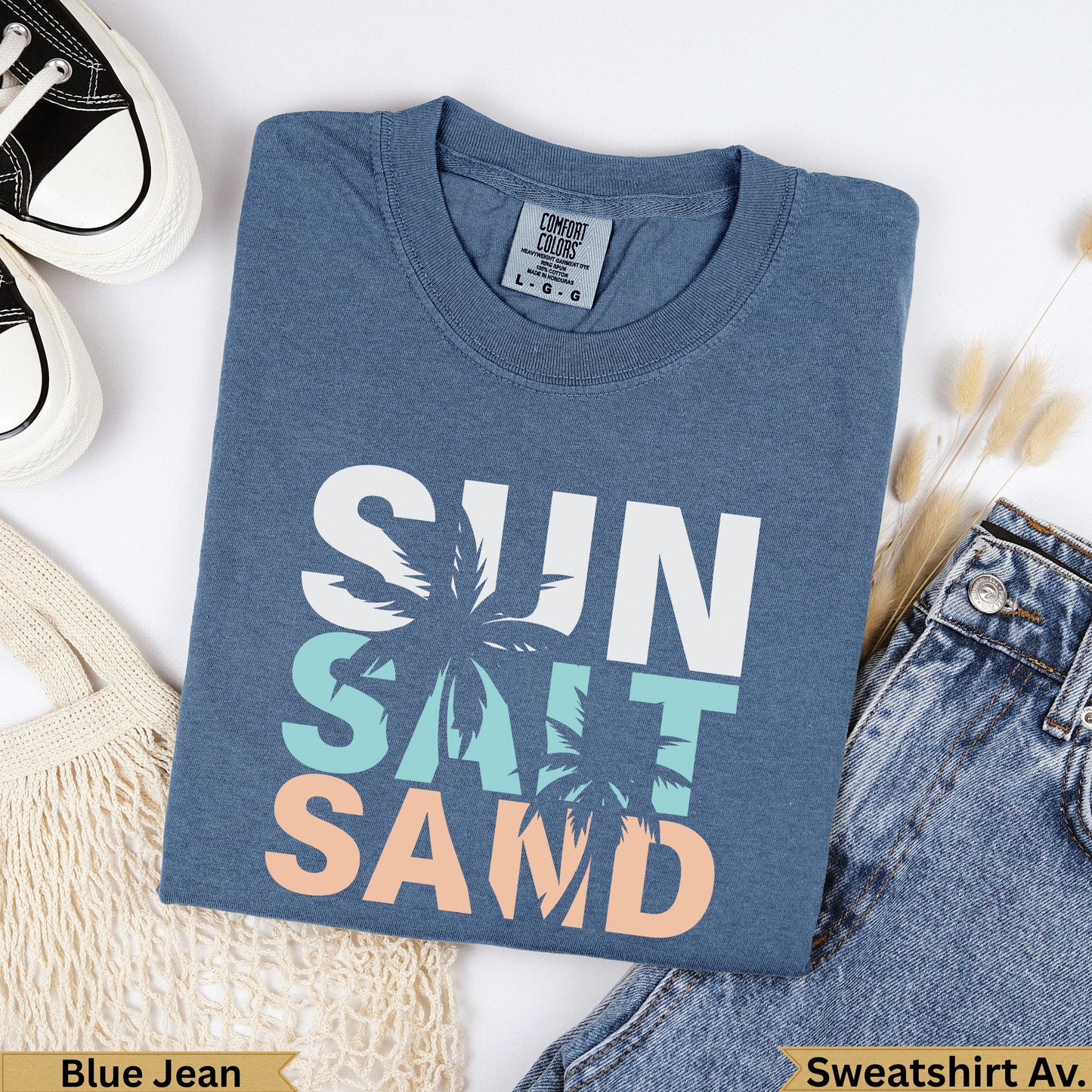 Blue Jean Comfort Colors t-shirt with "Sun Salt Sand" graphic.