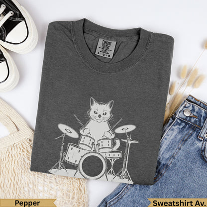 Dark grey graphic t-shirt with a cat playing drums, labeled "Pepper".
