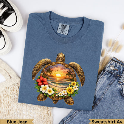 Blue t-shirt with a sea turtle and tropical sunset design, labeled "Blue Jean".