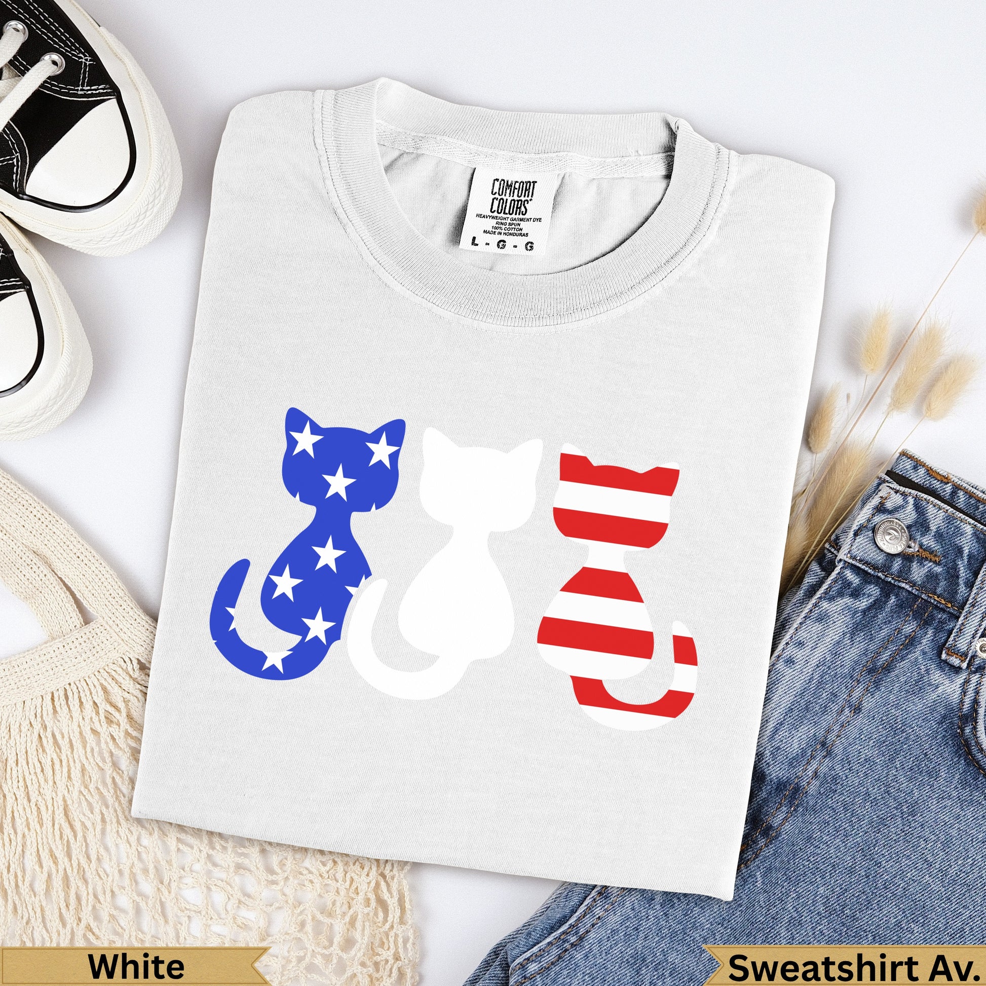 White t-shirt with three cat silhouettes, two with American flag pattern.