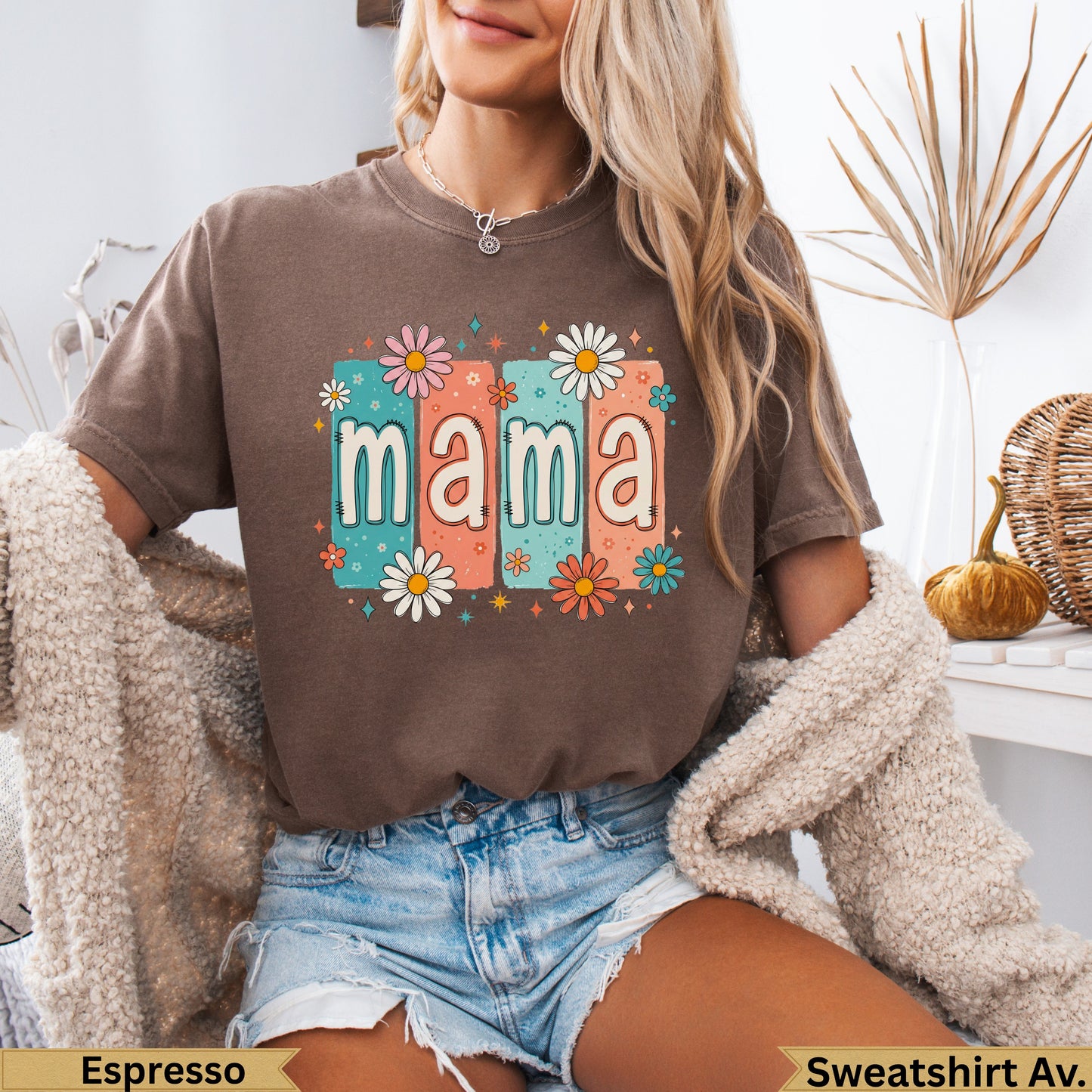 Brown t-shirt with "mama" in colorful floral letters.